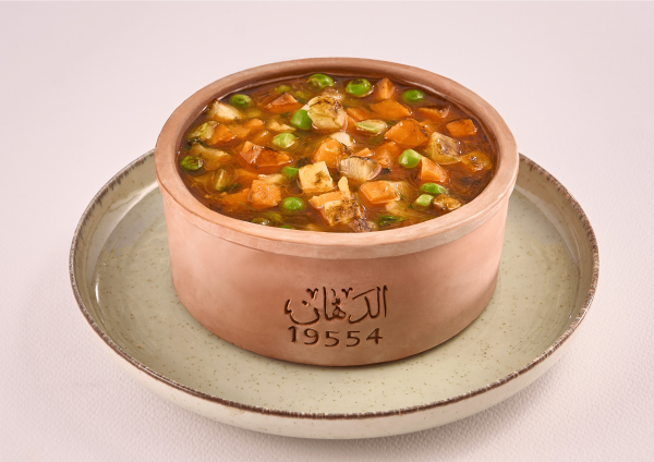 طاجن خضار مشكل باللحمة